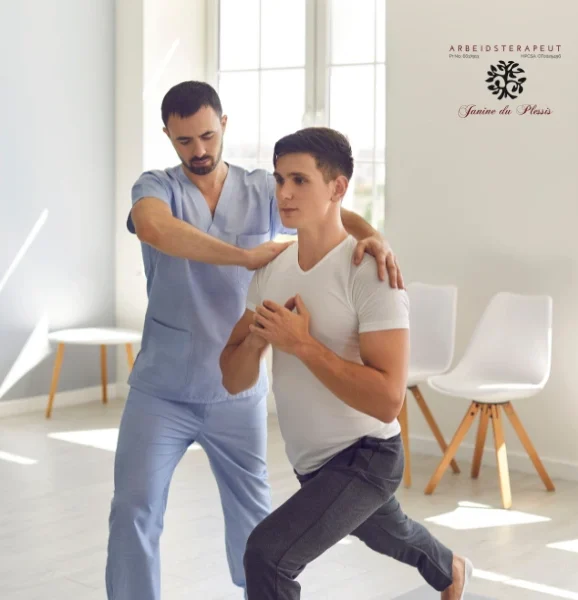 A male physical therapist in scrubs assists a male patient performing a lunge exercise, guiding his posture.