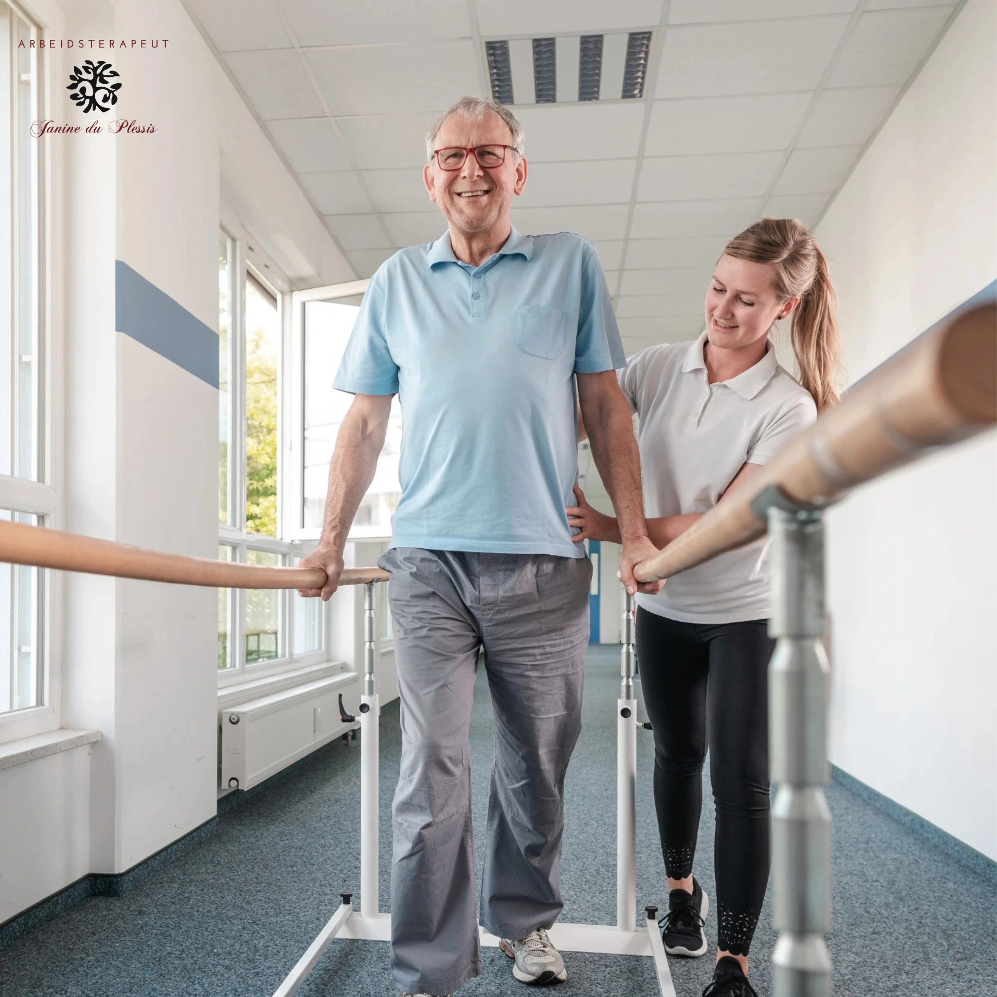 An elderly man smiling while walking with assistance bars, supported by a young female therapist in a rehabilitation setting.