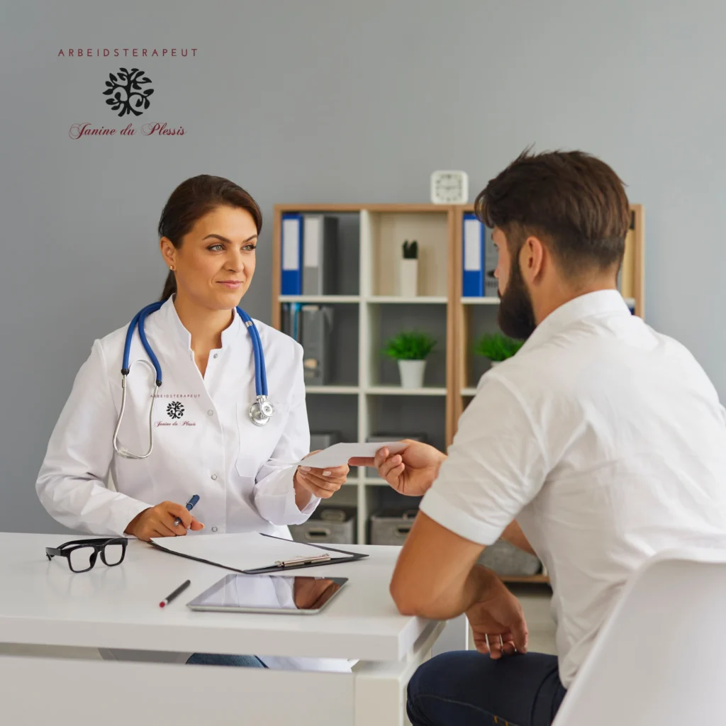 A female doctor or therapist in a white lab coat talking to and handing a document to a male patient.